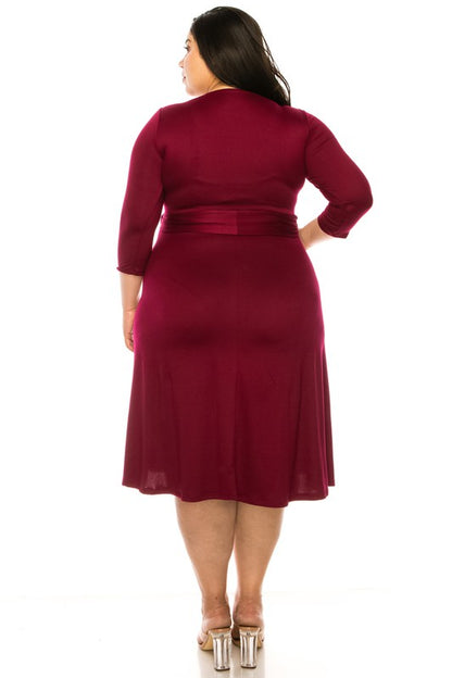 Plus size, solid faux wrap dress